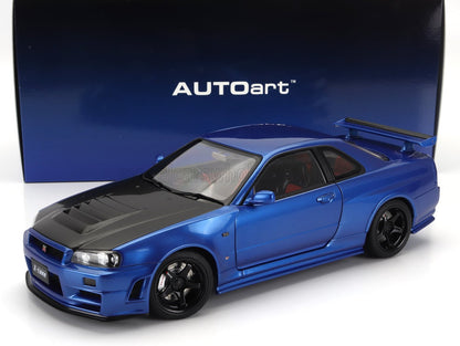 Modelo Nissan GT-R de AUTOart en color azul con capó de fibra de carbono y llantas negras, disponible en Vroomi.