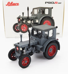 Modelo Schuco PRO.R32 del tractor IFA en color gris con ruedas rojas, réplica detallada fabricada en metal fundido disponible en Vroomi.
