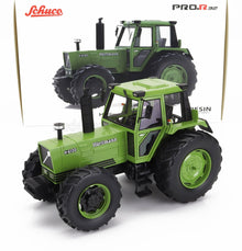 Maqueta del tractor Hürlimann H-6130 en color verde de Schuco con neumáticos detallados, expuesta con su caja, disponible en Vroomi.