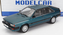 Coupé Audi azul, modelo a escala 1/18 fabricado en metal fundido a presión con interior detallado, disponible en Vroomi.