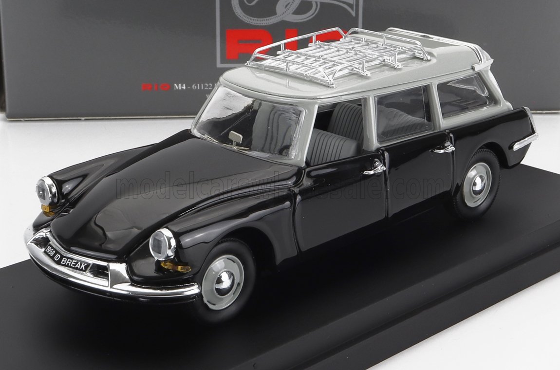 Coche clásico ID Break de 1958 en negro y gris con portaequipajes en el techo, expuesto en Vroomi.