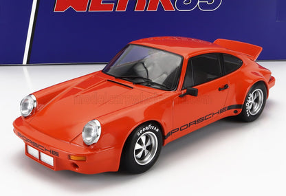 Orange Porsche 935 model car with Goodyear tires, showcased with Vroomi availability