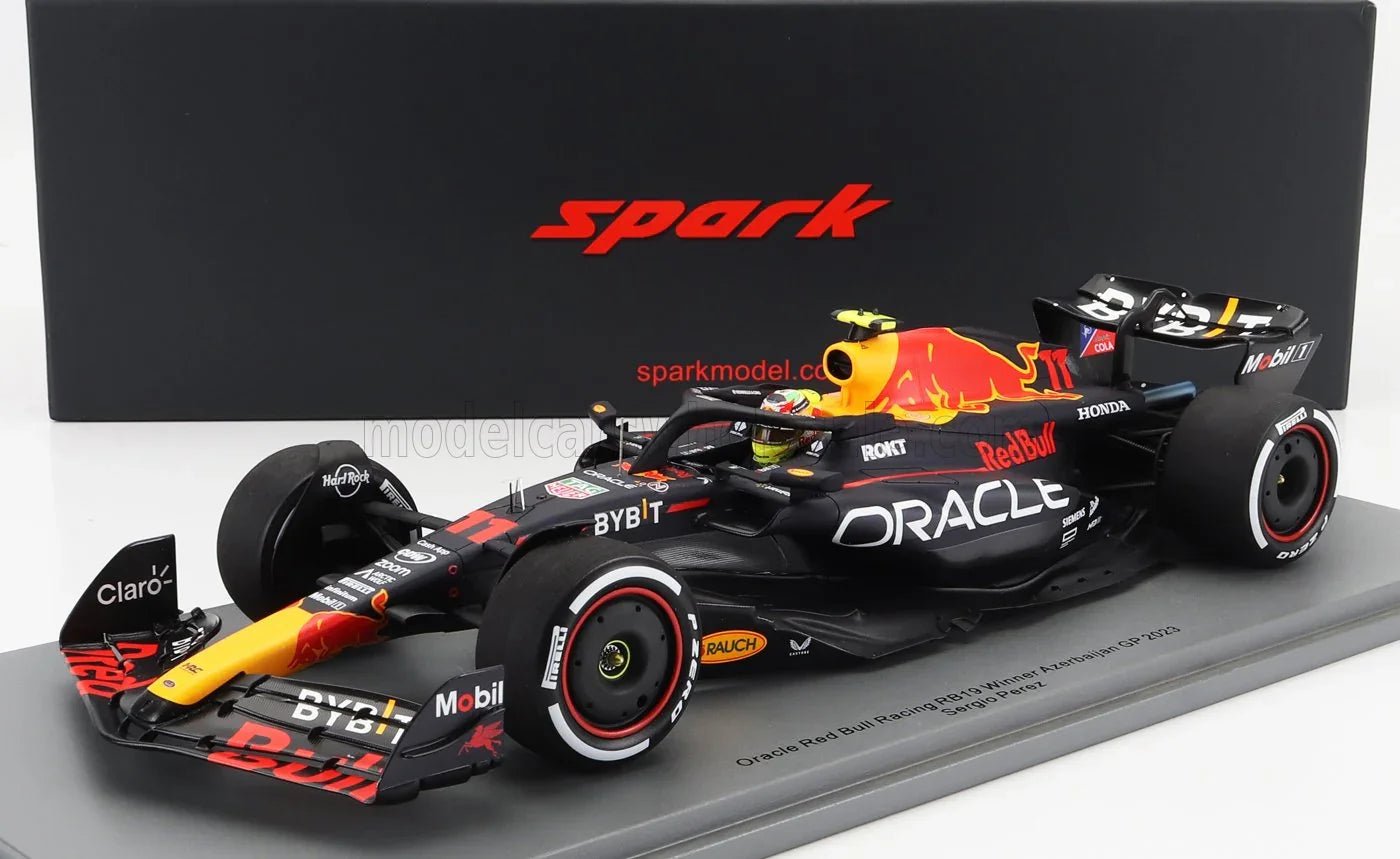 Modelo de coche Oracle Red Bull RB19 en negro y naranja con Red Bull , disponible en Vroomi.