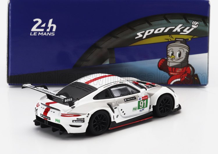 White Porsche 911 GT3 model car with red stripes and race decals, displayed with blue Sparky 24h Le Mans box, available on Vroomi