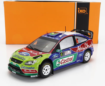 Coche de rally Ford Focus WRC a escala 1:18 con los colores de Castrol y Abu Dhabi, disponible en Vroomi.