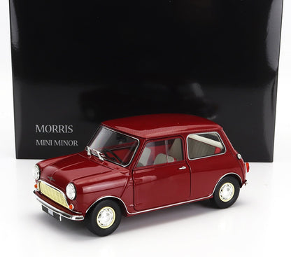 Red Morris Mini Minor model car with cream interior displayed against black box background, available on Vroomi