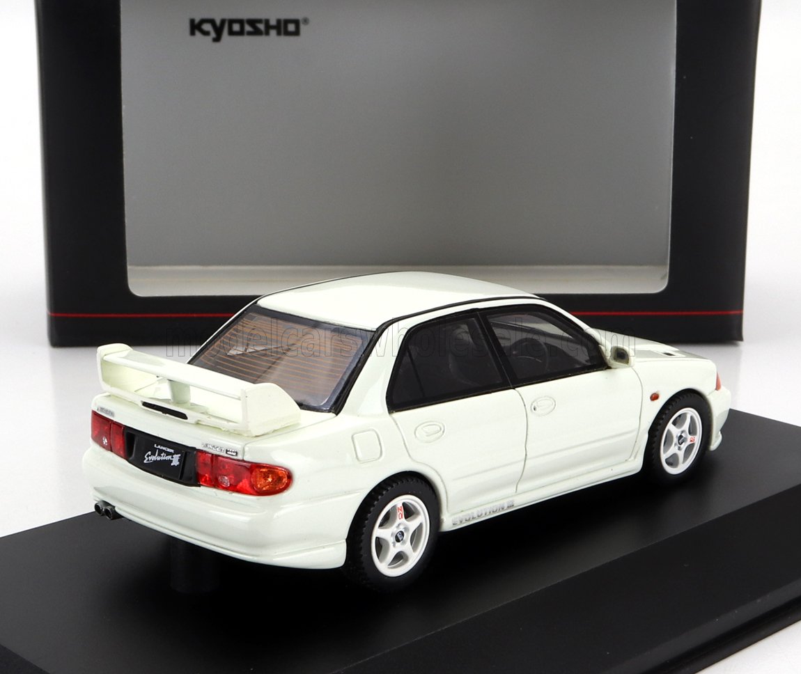 White Kyosho Mitsubishi Lancer Evolution III scale model car on black display base, offered on Vroomi
