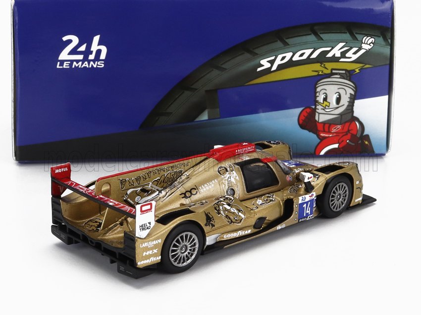 Modelo de coche de carreras de Le Mans de 24 horas en dorado y rojo con fondo de neumáticos Sparky, disponible en Vroomi.