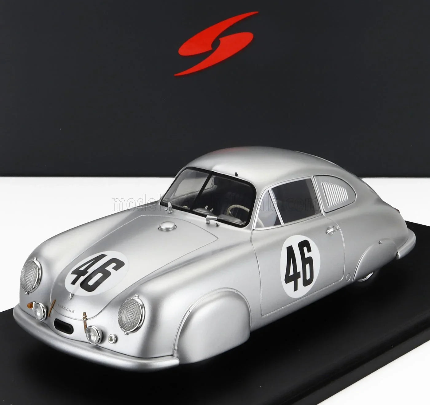 Silver vintage Porsche race car model with number 46 displayed, featured available on Vroomi platform