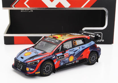 Modelo a escala 1/18 del coche de rally Hyundai WRC, coleccionable y fabricado en metal fundido, disponible en Vroomi.