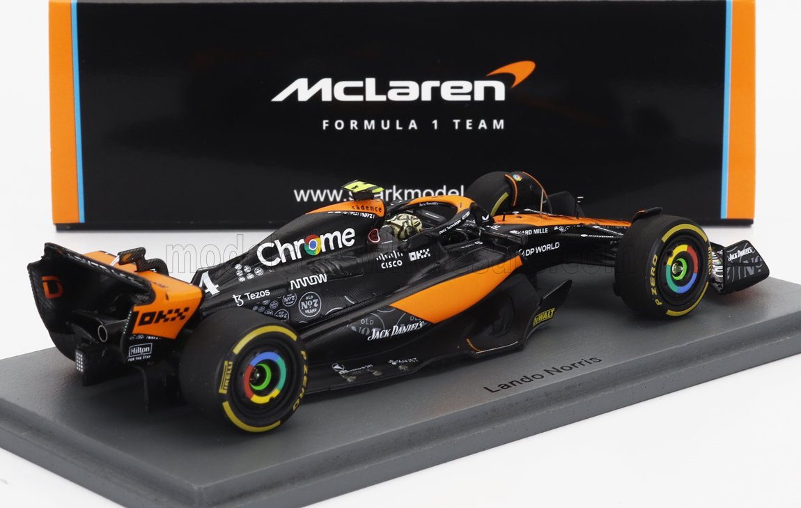McLaren Formula 1 model car in black and orange with Chrome branding, displayed with Lando Norris base, available on Vroomi