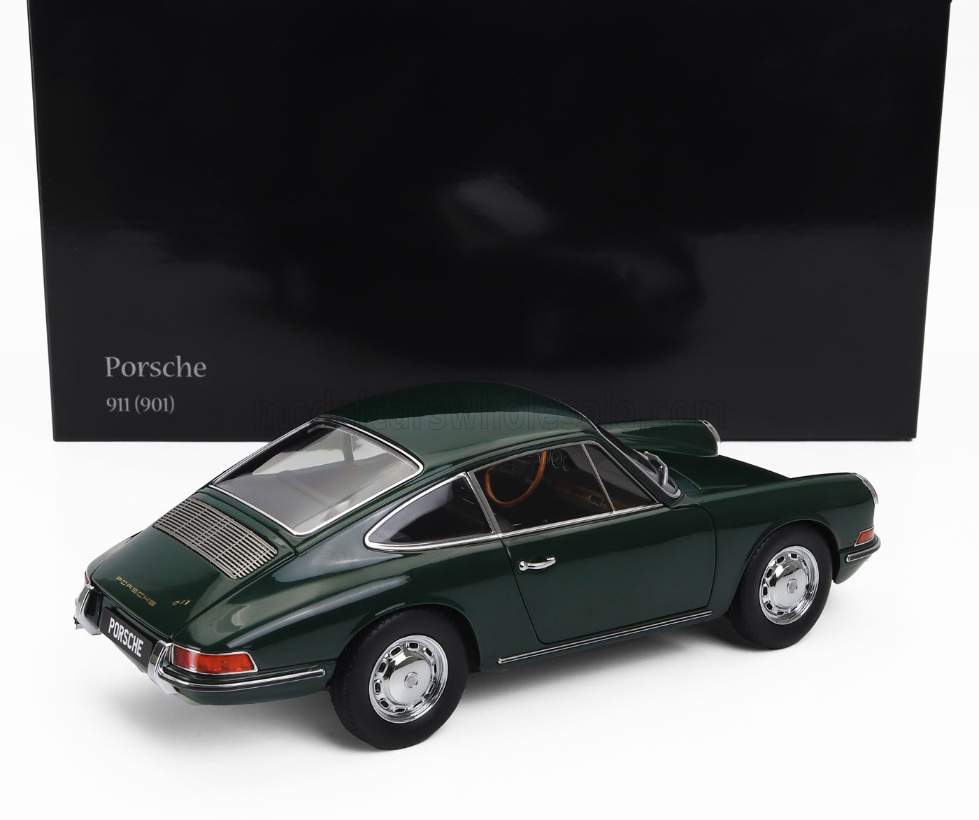 Green Porsche 911 (901) classic model car with chrome details, offered on Vroomi