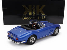 Modelo a escala 1:18 del Ferrari 275 GTS azul de 1967 con volante de madera, disponible en Vroomi.