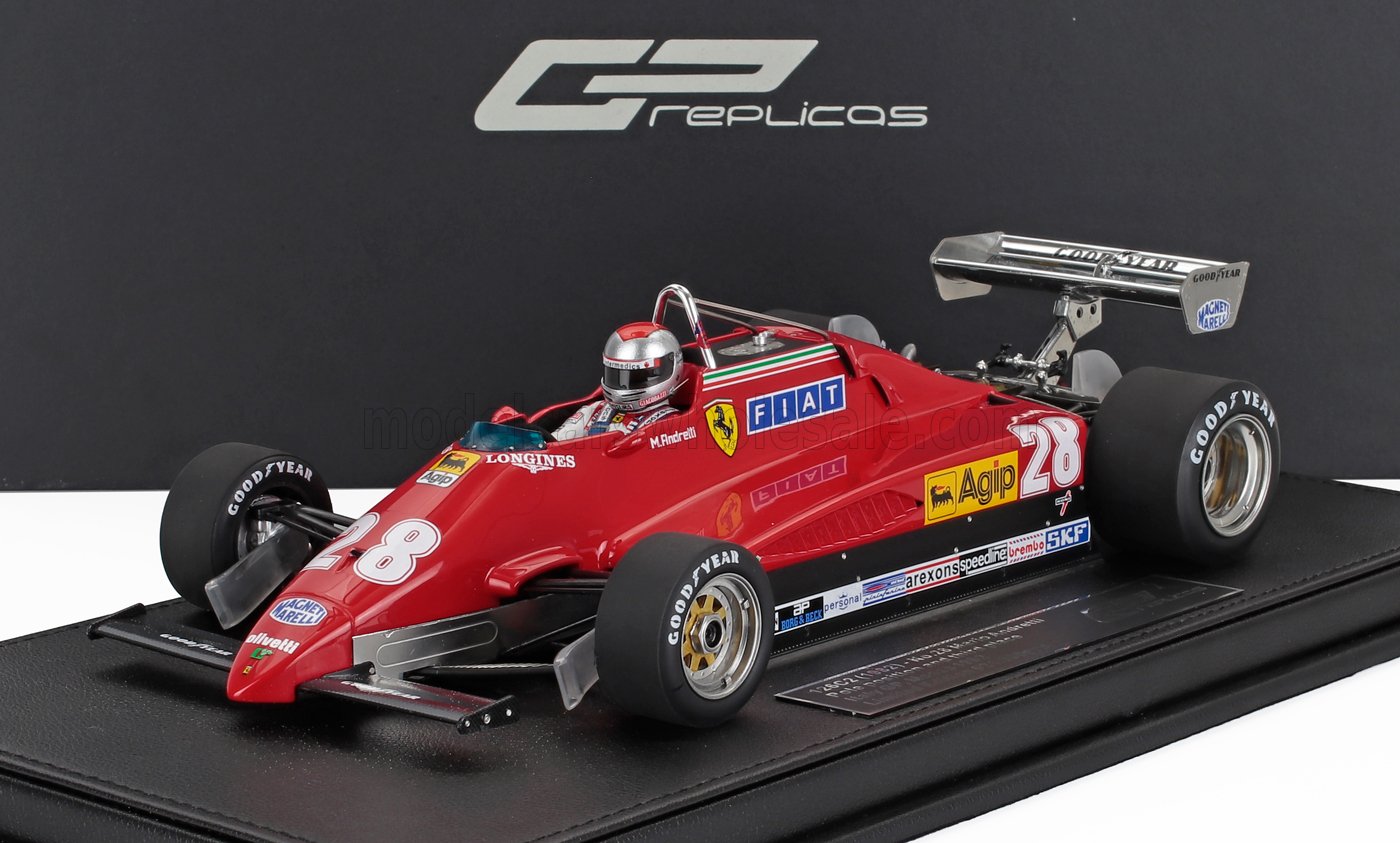 Coche de Fórmula 1 Ferrari rojo con el número 28, figura del piloto, pegatinas de patrocinadores, en exposición, anunciado en Vroomi.