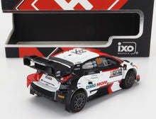1/43 scale Toyota rally car model with detailed livery, available at Vroomi for collectors