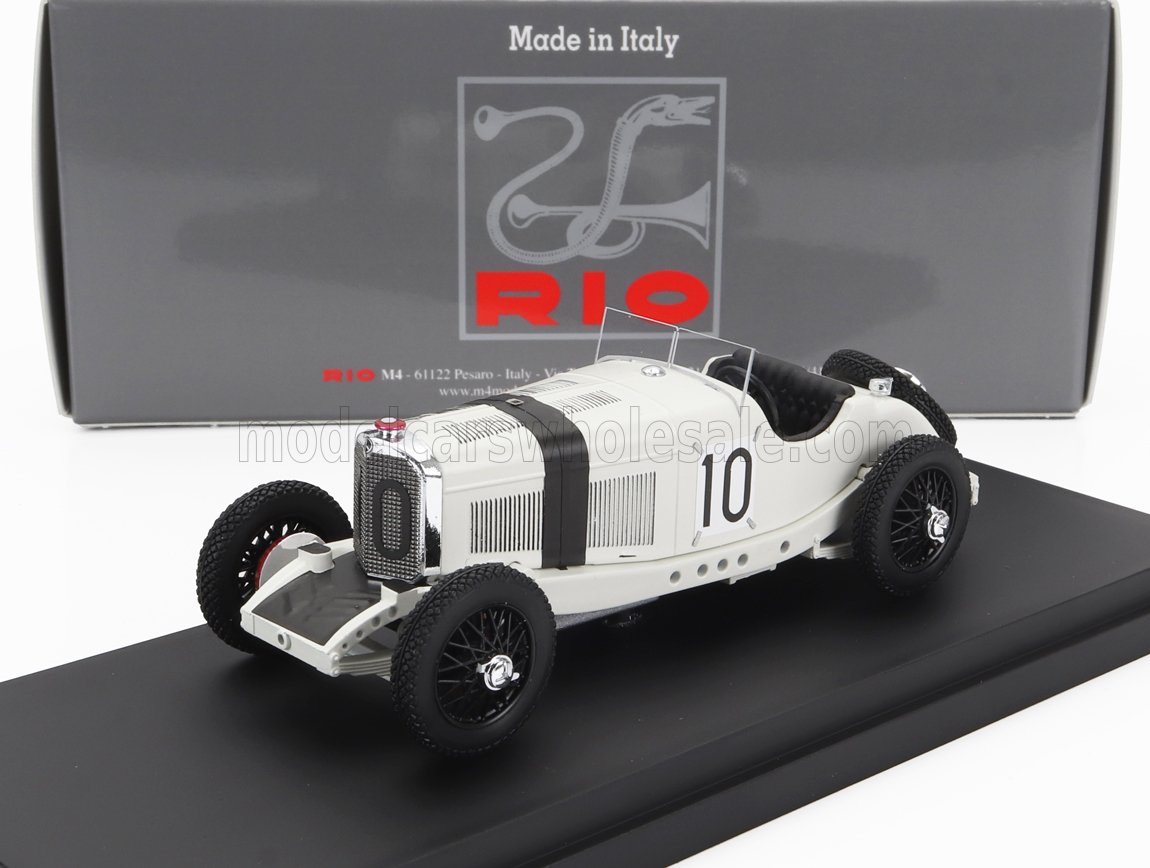 Modelo de coche de carreras vintage blanco número 10 sobre base negra con el logotipo de Rio y origen italiano, disponible a través de Vroomi.
