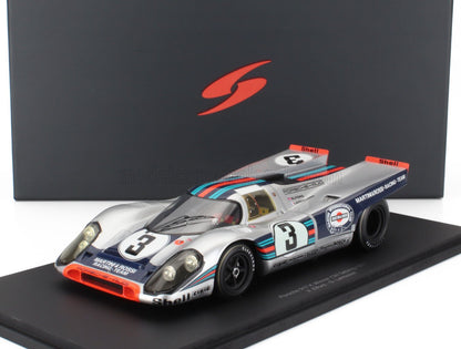 Porsche 917K Martini Racing Team model car in silver with blue and red stripes, displayed with black box, available on Vroomi