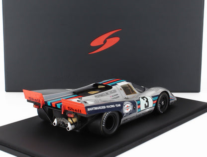Porsche 917 race car model with Martini & Rossi livery on black display, available on Vroomi