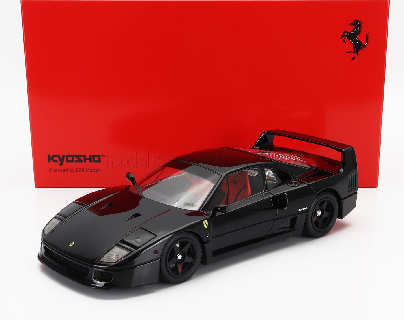 Modelo a escala 1/18 del Ferrari F40 negro de Kyosho con caja roja, coleccionable en Vroomi.