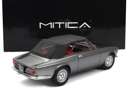 Coche clásico gris con capota blanda negra e interior rojo, con la marca MITICA, a la venta en Vroomi.