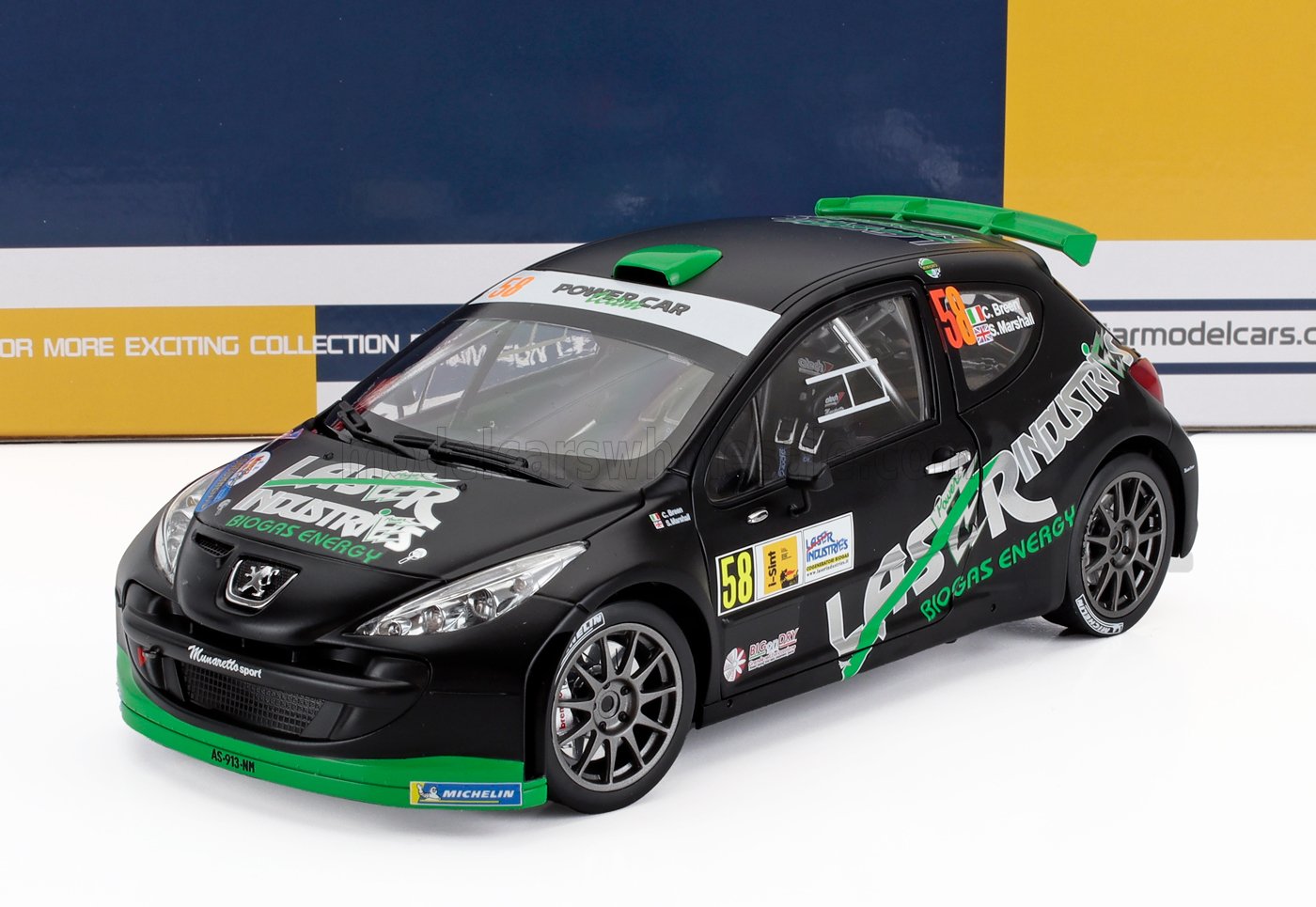 Modelo de coche de rally Peugeot a escala 1/18 con los colores de Laser Industries, coleccionable y disponible en Vroomi.