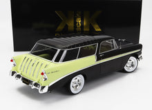Coche de juguete Chevrolet Bel Air de 1955 en color negro y verde lima con detalles cromados, ruedas y neumáticos con banda blanca, disponible en Vroomi.
