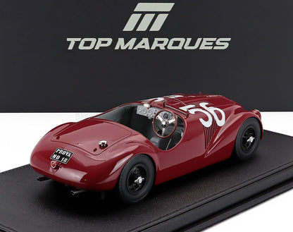 Maqueta de coche de carreras vintage rojo con el número 56, actualmente disponible en línea en Vroomi.