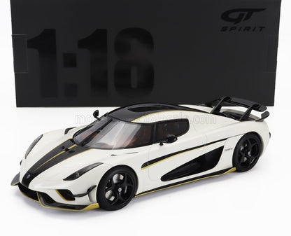 1:18 scale model of white and black Koenigsegg Regera with gold accents, displayed with GT Spirit box, available at Vroomi