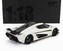 1:18 scale Koenigsegg Regera model car in white and black with gold accents, available at Vroomi