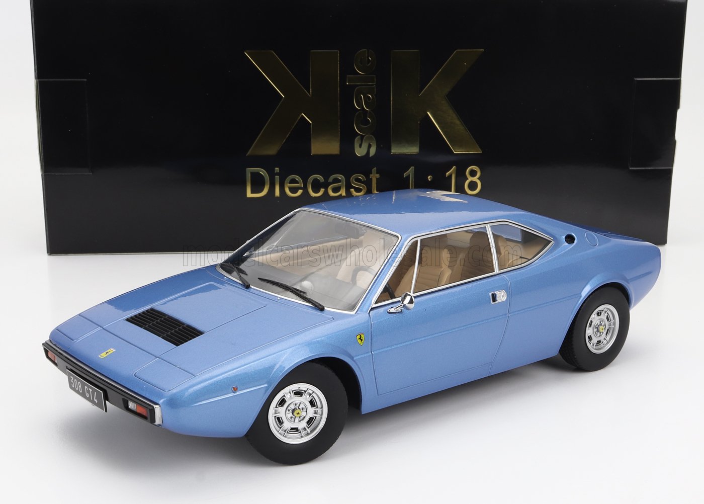 Coche de juguete Ferrari 308 GT4 a escala 1:18 en color azul con interior detallado, ya disponible en Vroomi.