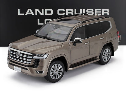 Metallic brown Toyota Land Cruiser model car with chrome wheels and roof rails, now on Vroomi