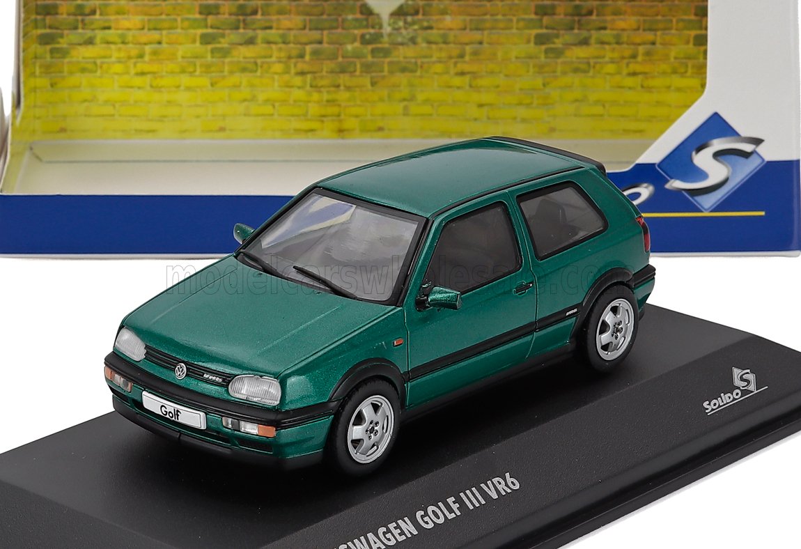 Coche coleccionable Volkswagen Golf III VR6 verde a escala 1/43 en caja, ahora disponible online.