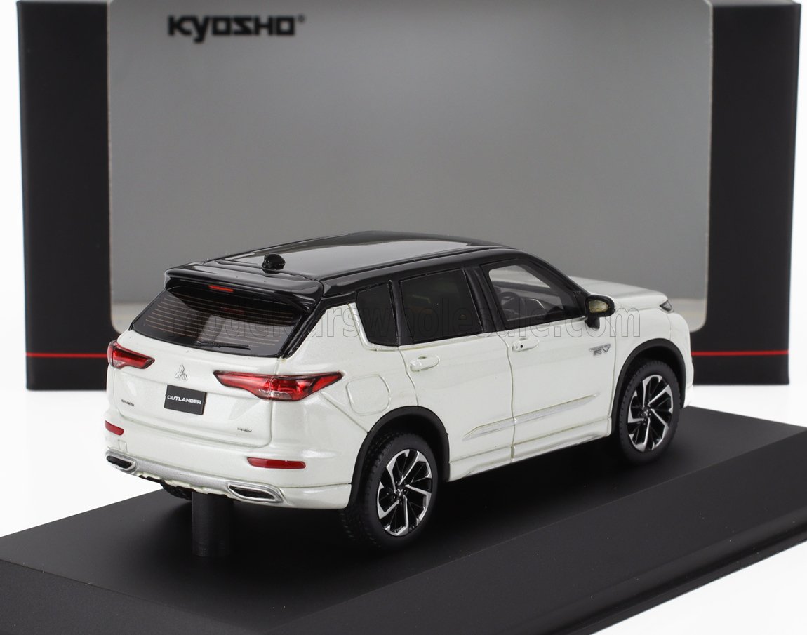 White Mitsubishi Outlander model car with black roof on display stand, available on Vroomi