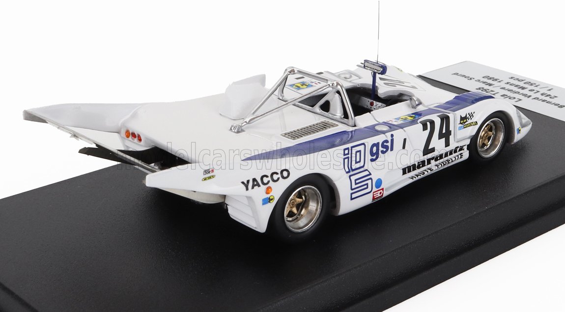 White vintage race car model with number 24, sponsor decals, and rear wing, showcased on black base, available on Vroomi