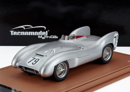 Silver vintage Tecnomodel racing car model with number 79 on a brown base, available via Vroomi