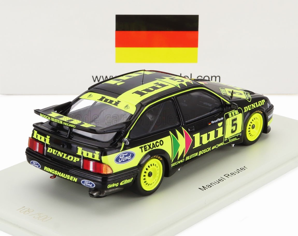 Modelo de coche de carreras Ford negro y amarillo neón con los logotipos «lui» y «Dunlop», disponible en Vroomi.