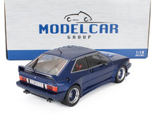 Coche modelo Scirocco azul a escala 1:18 fabricado en metal fundido con alerón trasero y asientos de carreras, disponible en Vroomi.