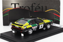 Modelo de coche de rally Audi a escala 1:43 fabricado en metal fundido, con decoración en verde y amarillo y detalladas calcomanías de competición, ya disponible.