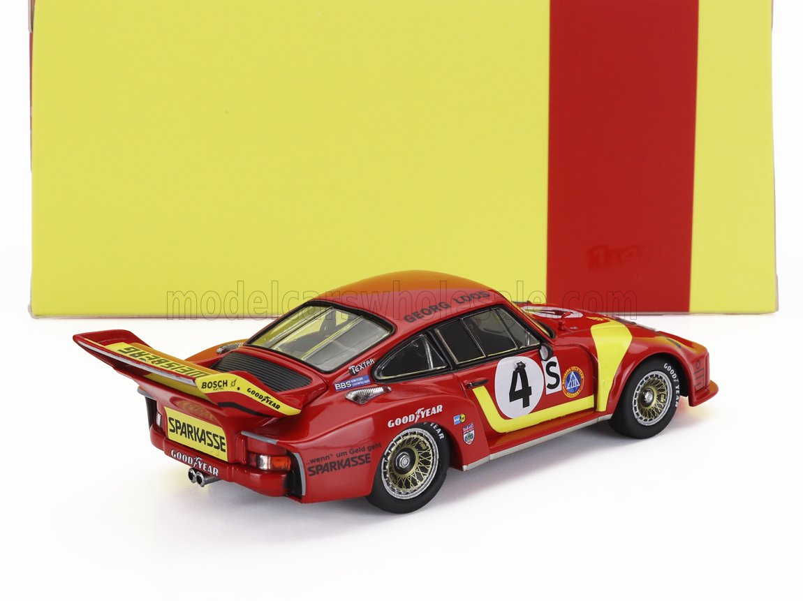 Red vintage Porsche race car model with yellow accents and racing decals, available on Vroomi