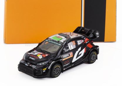 Modelo de coche de rally Toyota Gazoo Racing negro con logotipos de patrocinadores y calcomanías detalladas, disponible en la plataforma Vroomi.