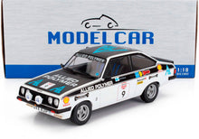 Coche de rally Allied Polymer a escala 1:18 fabricado en metal fundido con calcomanías, expuesto delante de la caja Model Car, disponible en Vroomi.