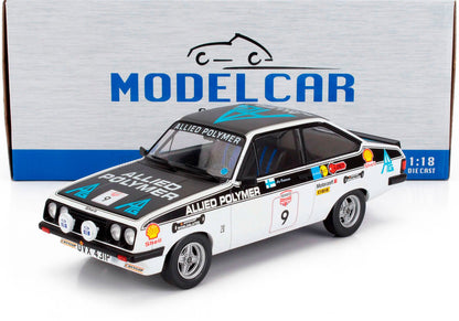 Coche de rally Allied Polymer a escala 1:18 fabricado en metal fundido con calcomanías, expuesto delante de la caja Model Car, disponible en Vroomi.