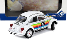 Modelo de coche VW Beetle blanco con adhesivos de Apple Computer Inc, rayas de colores, número 9 negro, vendido en Vroomi.