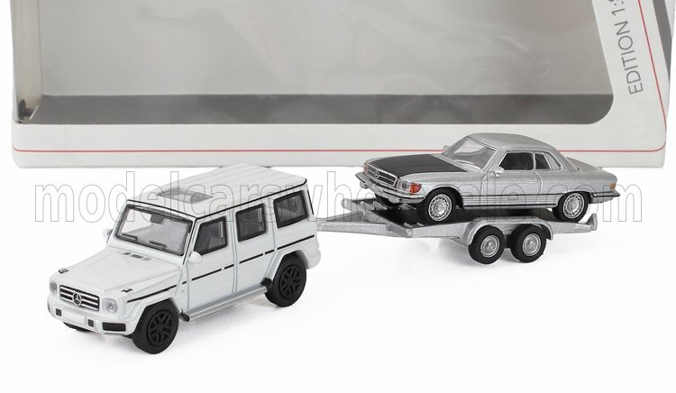 MERCEDES BENZ - CLASE G (W463) 2018 CON REMOLQUE + CLASE SL 450SLC 5.0 COUPÉ (C107) 1980 - BLANCO PLATEADO NEGRO - Vroomi