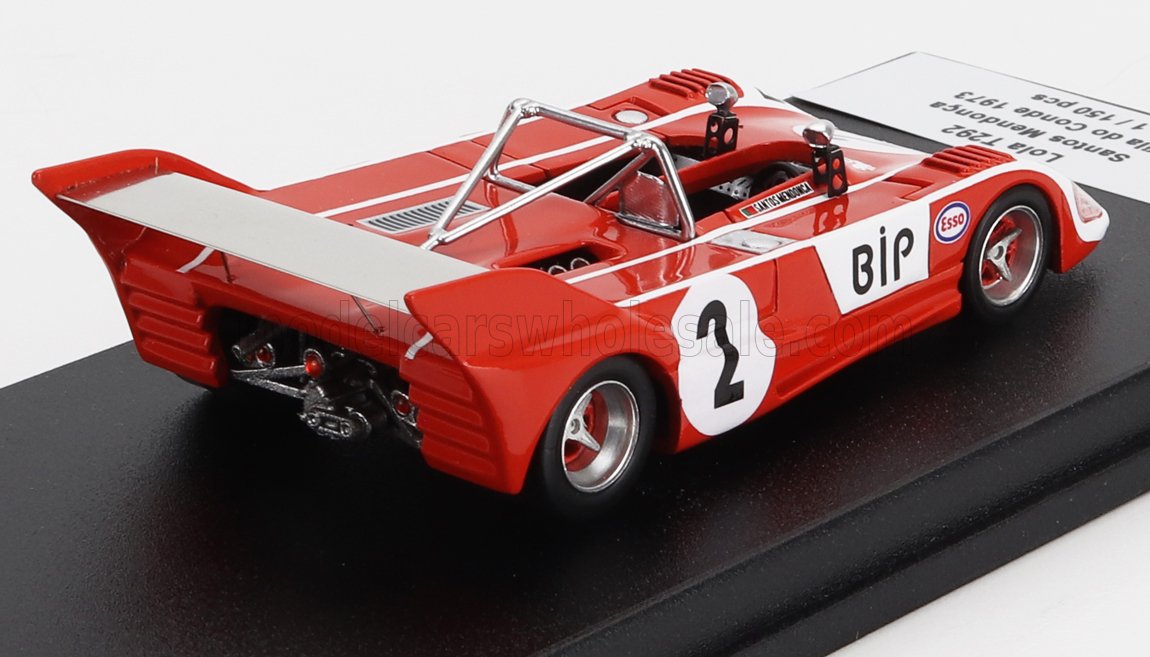 Red vintage Lola T292 race car model with number 2 and BiP logo on display, available on Vroomi