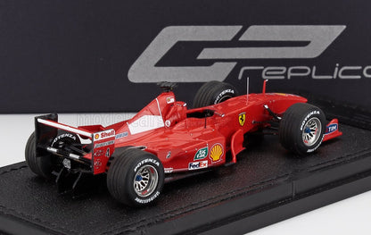 Red Ferrari F1 model car with Bridgestone tires and sponsor decals, offered on Vroomi