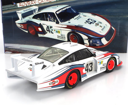 Martini Porsche 43 race car model with red wheels and sponsor decals, featured on Vroomi platform