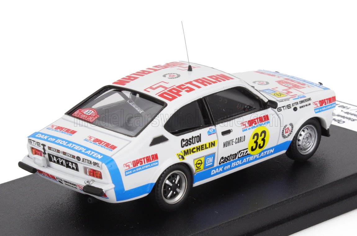 Modelo de coche de rally blanco fundido a presión con el número 33 y pegatinas de patrocinadores, actualmente a la venta en Vroomi.