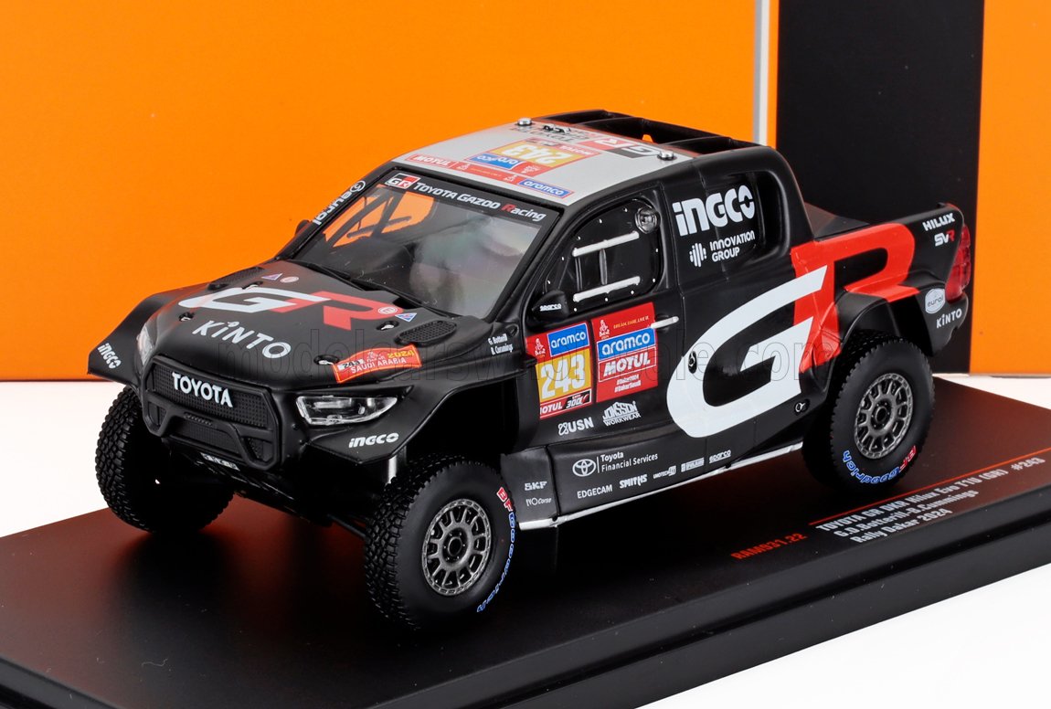 Modelo de coche de rally Toyota Gazoo Racing negro con logotipos GT y VINTO, expuesto en un soporte, disponible en Vroomi.