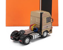 Die-cast scale model truck cab in gold with TurboLeader decals, available at Vroomi